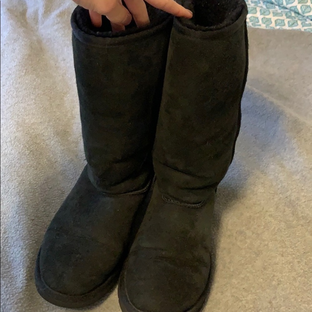 Tall black UGG boots